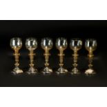 A Set of Eight German Flash Glass Coloured Hoch Glasses with lozenge to the stem and ribbed base.