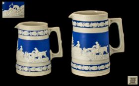 Two Antique Copeland Spode Jasper Ware Jugs with hunting scenes, in cream,