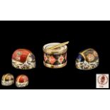 Royal Crown Derby Hand Painted Paperweights, three comprising 1/ Ladybird - two spot, no stopper,