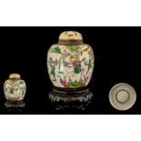 Chinese Antique Crackle Glazed Ginger Jar and Cover decorated to the body in famille verte coloured