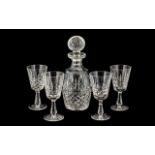 Collection of Crystal Glassware comprising two decanters with decorative stoppers;