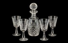 Collection of Crystal Glassware comprising two decanters with decorative stoppers;