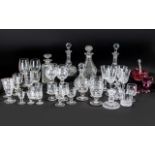 Collection of Cut Glass comprising 5 decanters, various drinking glasses, candlesticks,