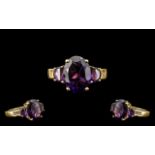 Deep Purple Amethyst Oval and D Cut Ring, a 5ct oval cut, rich, deep purple amethyst, set with a .