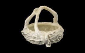 Royal Worcester Mid 19th Century White Porcelain Basket. Marked to base, 7'' tall x 8'' width. Minor