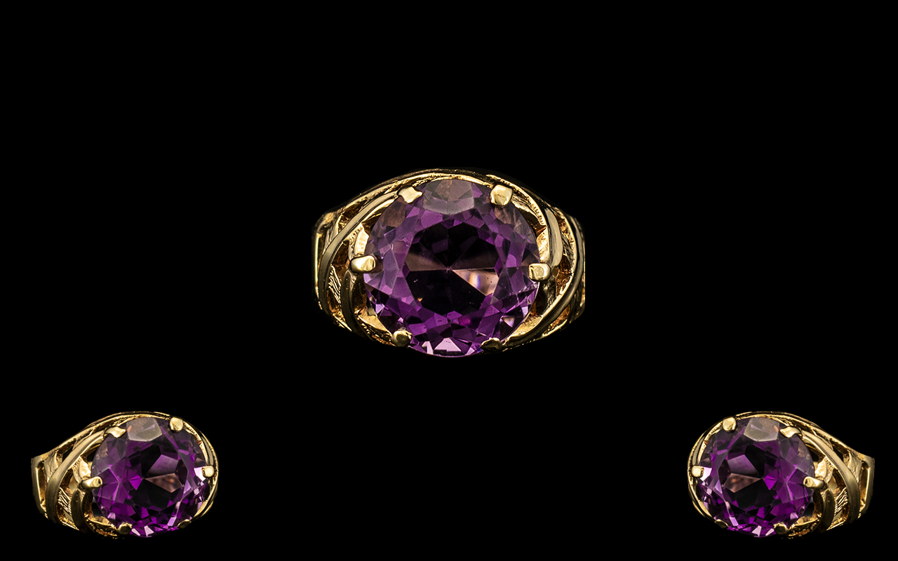 9ct Gold Attractive Single Stone Amethyst Set Ring marked 9ct.