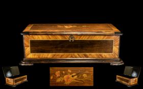 An Antique Rosewood Music Box Case with inlaid top and cross banding.