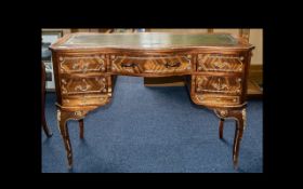 A French Style Serpentine Writing Desk Mid to Late 20th Century green leather top above central