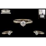 18ct Single Stone Diamond Ring round modern cut diamonds in a 4 claw setting together with IGI
