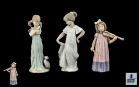 Lladro and Nao Hand Painted Figures, three comprising one Lladro, 'Don't Forget Me' model no.