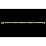 Natural Opal Tennis Bracelet, oval cabochon cut opals, with a beautiful display of natural colours,