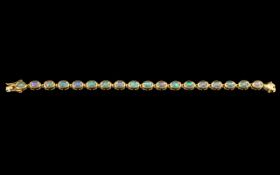 Natural Opal Tennis Bracelet, oval cabochon cut opals, with a beautiful display of natural colours,