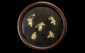 A Japanese Round Lacquered Wall Plaque with applied carved figures in bone of boys playing various
