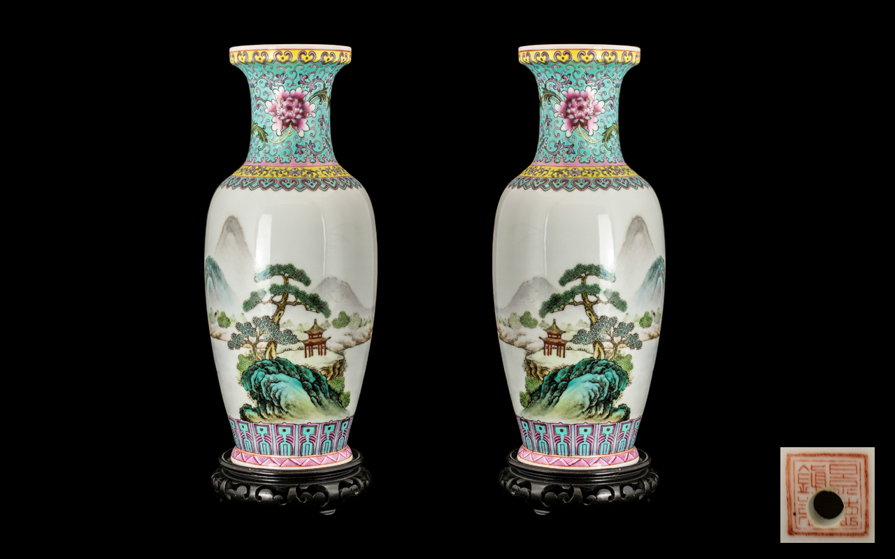 Pair of Chinese 20th Century Vases painted in a Famille Rose palette,