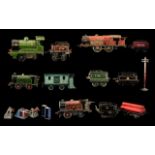 A Collection of Mostly Tin Plate Carriages & Rolling Stock, to include clockwork engines, buffers,