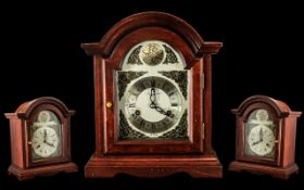 Tempus Fugit Mahogany Cased 8 Day Striking Mantle Clock strikes on two rods.