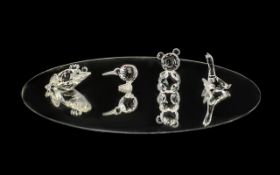 Collection of Four Swarovski Figures, in original boxes, comprising: Frog No. 7642 NR04800; Kiwi