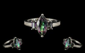 Northern Lights Mystic Topaz Ring, a 3ct marquise cut of the purple and green mottled,