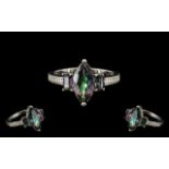 Northern Lights Mystic Topaz Ring, a 3ct marquise cut of the purple and green mottled,