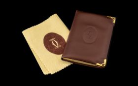 Vintage Cartier Burgundy Leather Address Book in original box with dust cover. Rare item.