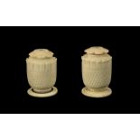 Pair of Anglo Indian Carved Ivory Pepperettes, c1860s, with screw petal shaped lids,
