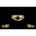 Citrine East-West Set Solitaire Ring, an oval cut citrine of 5cts set across the finger,