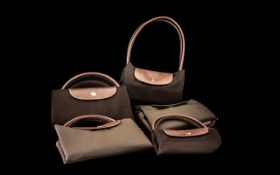 Collection of Four Longchamp Foldaway Tote Bags,