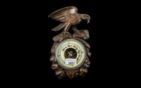 Black Forest Carved Wood Wall Barometer depicting a bird standing on a rocky outcrop;
