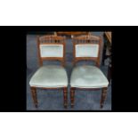 A Pair of Edwardian Oak Salon Chairs with turned legs, upholstered in blue velour back and seat.