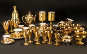 A Good Collection of Gilt Ornamental Ware comprising of a teaset with cups, saucers, teapot,