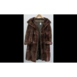 Ladies Musquash Coat in rich brown colour, with shawl collar and turn back cuffs,