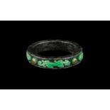 Oriental Bangle of Unusual Form, green stone chilogs applied to the grey marble body of the bangle,