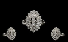 Platinum - Superb Quality Diamond Set Cluster Ring, Boat Shaped Design on 3 Steps Raised. The