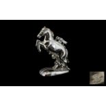 1930s Chromed Metal Petrol Cigarette Lighter in the shape of a rearing horse,