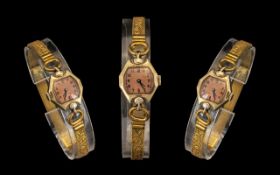 1930`S Ladies Watch in Original Case. Gold tone adjustable cocktail watch with original box.