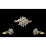 18ct Gold Attractive Starburst Diamond Set Cluster Ring.