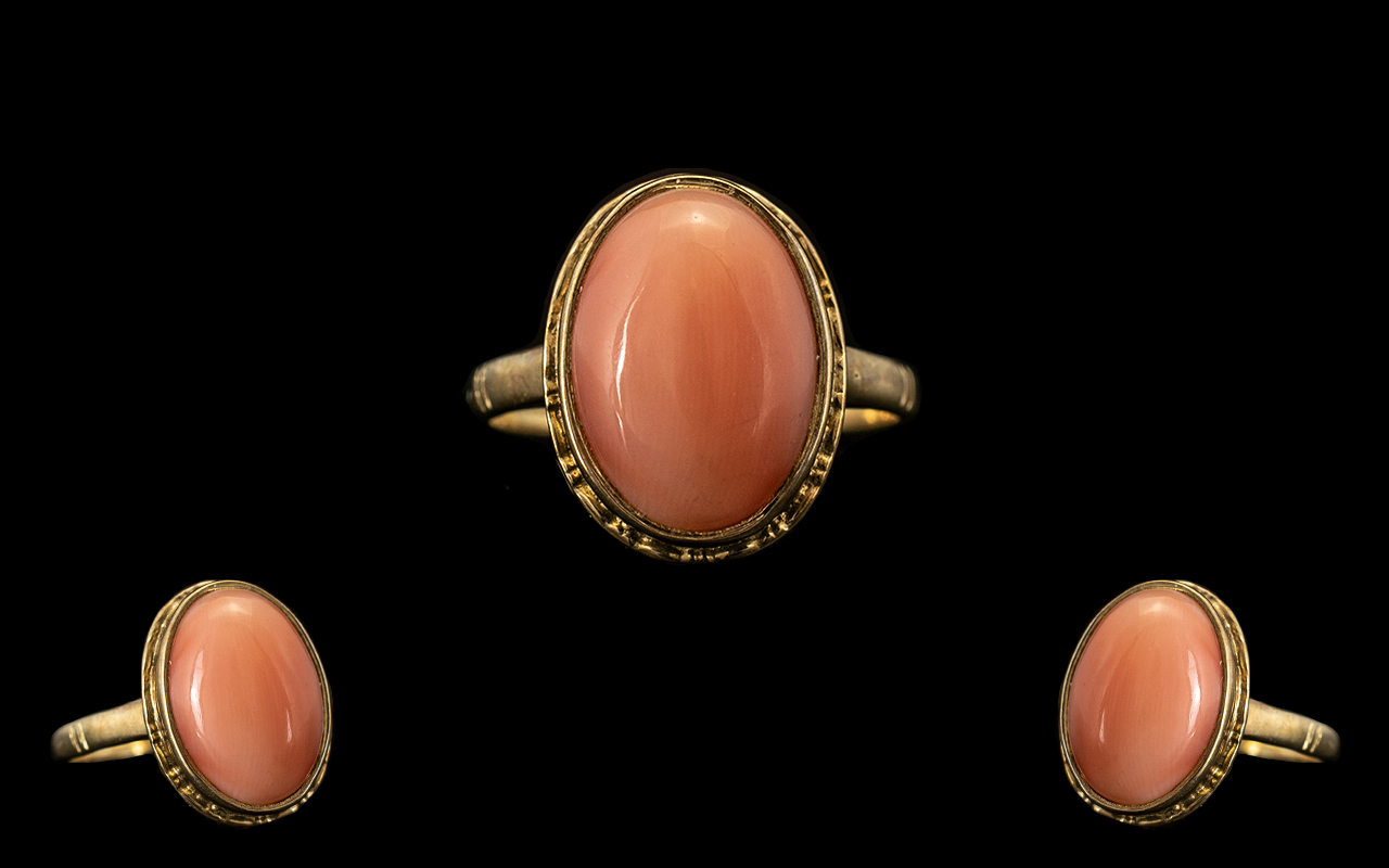 9ct Gold Attractive Single Stone Pink Coral Set Dress Ring.