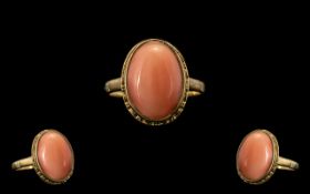 9ct Gold Attractive Single Stone Pink Coral Set Dress Ring.