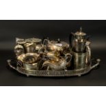 Collection of Silver Plated Ware comprising a large tray with handles, four teapots and eighteen