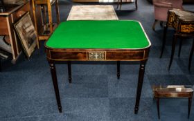 Late Georgian Mahogany Green Beige Card Table with a fold over top and supported on turned legs,