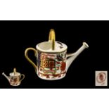 Royal Crown Derby Miniature Watering Can complete with original box, measures 3" tall.
