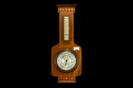 Art Deco Mahogany Inlaid Wall Barometer with thermometer and silvered dial; 20 inches high (A/F).