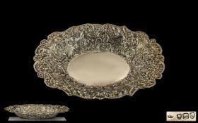 Late Victorian Period Ornate Sterling Silver Dish with excellent embossed decoration to sides and