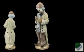 Lladro Handpainted Porcelain Figure ' Sad Sax' Clown, model No. 5471. Issued 1988.