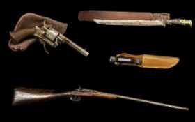 A 19thC Belgian Rifle with a steel barrel half wooden chequred stock, various proof marks.