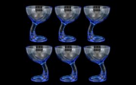 Set of Six Blue Glass Stemmed Sundae Dishes of unusual shape;