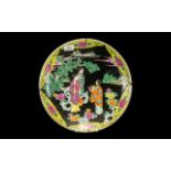Japanese Charger with Black Enamel Body Colour with a scene of elegant female figures in a