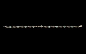 9ct White Gold Bracelet. Hallmarked white gold bracelet set with aquamarine and CZ, excellent