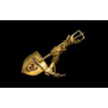 Unusual 14ct Gold Brooch in the form of a Pickaxe, Spade and Large Gold Nugget, entwined by a rope.