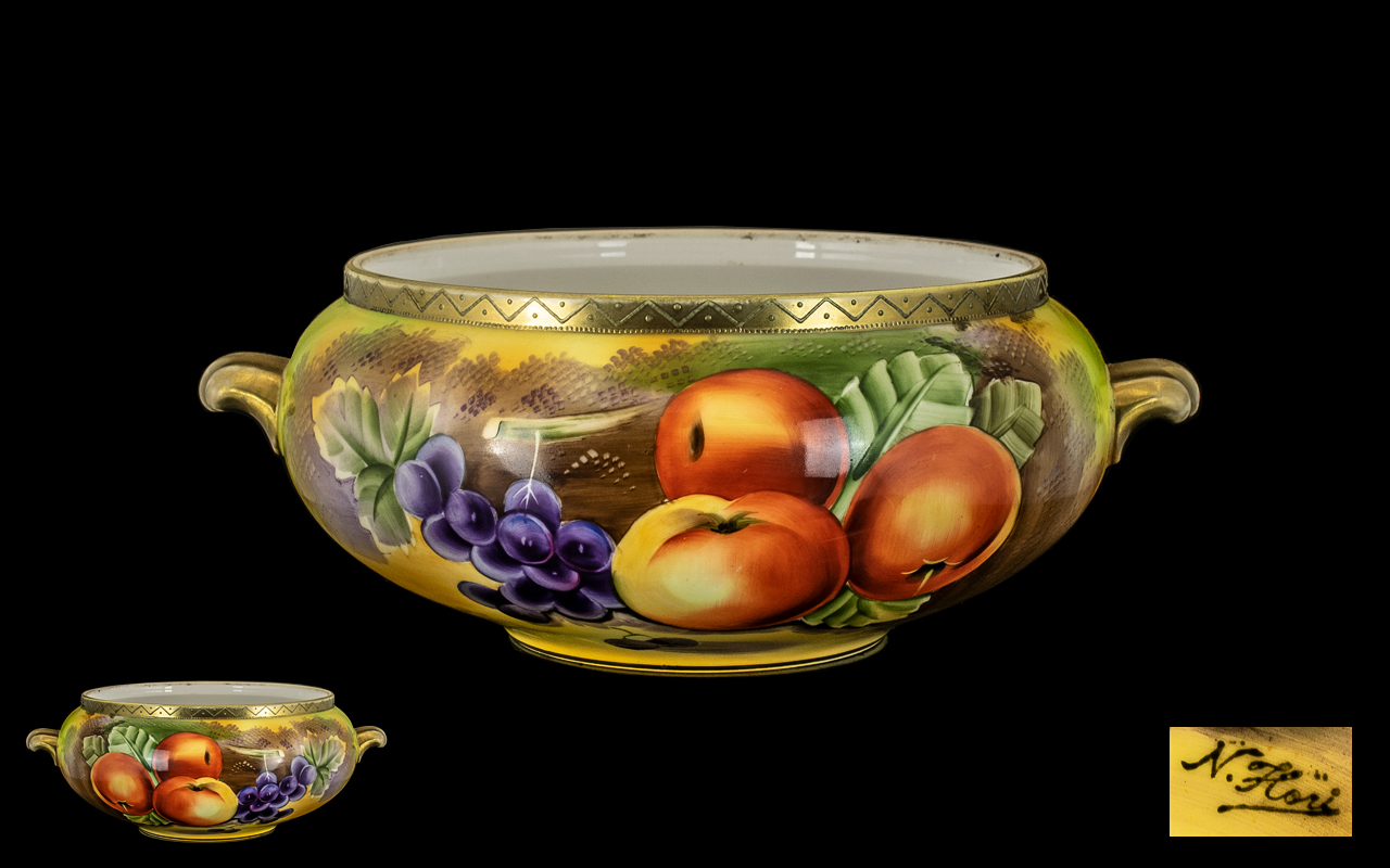 Porcelain Painted Bowl with Gilt Side Handles, depicting fruit on a mossy bank, signed N. - Image 2 of 2